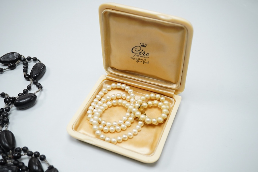 Two coral necklaces and a group of costume jewels, comprising: two coral bead necklaces, each with a gold clasp, combined gross weight approximately 35 grams; together with a simulant pearl necklace and pair of earrings